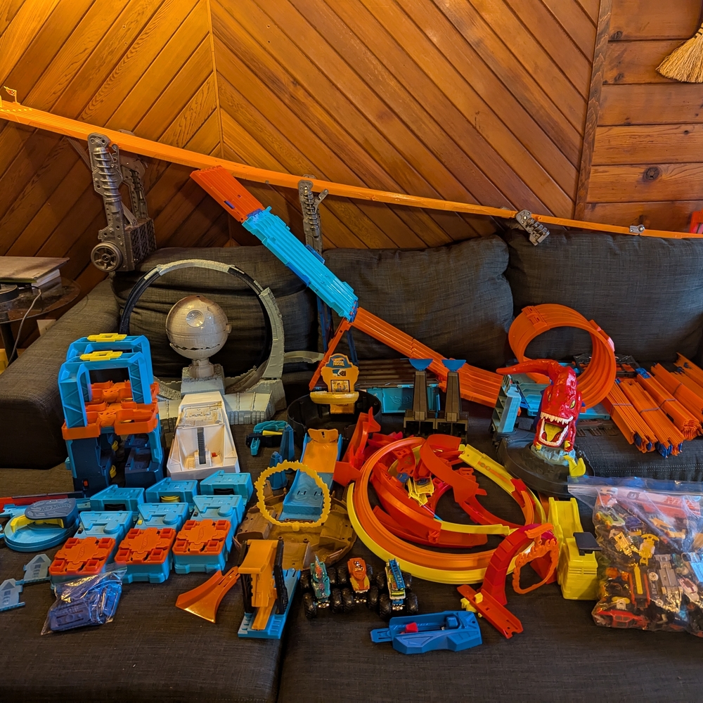 Large Collection of Hot Wheels Cars and Tracks